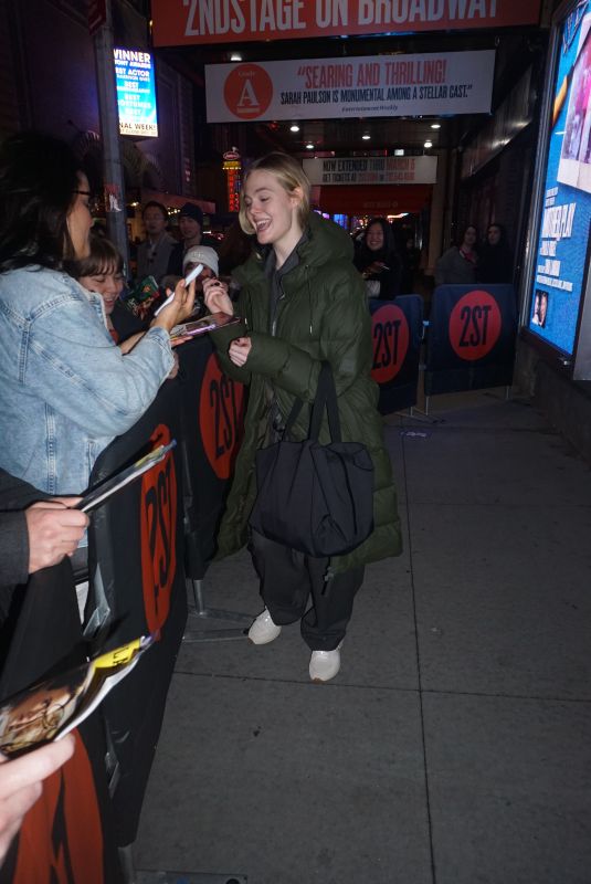 ELLE FANNING Signing Autographs Outside Hayes Theatre at Broadway in Manhattan 12/26/2023
