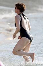 EMMA FORBES in a Black Swimsuit at Sandy Lane Hotel