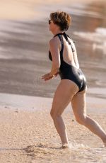 EMMA FORBES in a Black Swimsuit at Sandy Lane Hotel