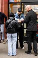 GIGI HADID Visiting Bradley Cooper at a Food Truck in New York 12/06/2023