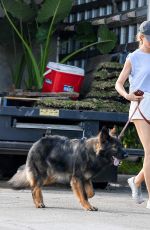 GISELE BUNDCHEN Out for a Dog Walk in Miami 12/08/2023