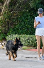 GISELE BUNDCHEN Out for a Dog Walk in Miami 12/08/2023