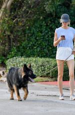 GISELE BUNDCHEN Out for a Dog Walk in Miami 12/08/2023