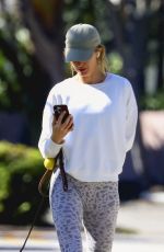 GISELE BUNDCHEN Out with Her Dog in Miami Beach 12/19/2023