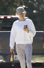 GISELE BUNDCHEN Out with Her Dog in Miami Beach 12/19/2023