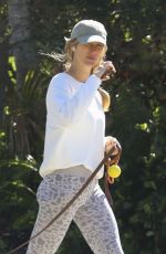 GISELE BUNDCHEN Out with Her Dog in Miami Beach 12/19/2023