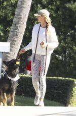 GISELE BUNDCHEN Out with Her Dog in Miami Beach 12/19/2023