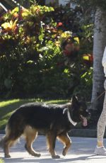 GISELE BUNDCHEN Out with Her Dog in Miami Beach 12/19/2023