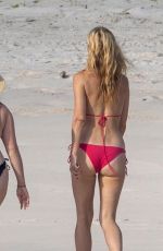 GWYENTH PALTROW in a Red Bikini at a Beach in Mexico 12/20/2023