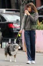 HELENA CHRISTENSEN Out for Morning Coffee with Her Dog in New York 12/17/2023