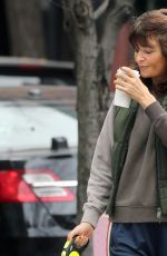 HELENA CHRISTENSEN Out for Morning Coffee with Her Dog in New York 12/17/2023