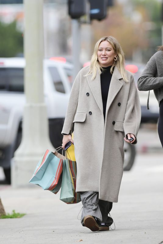 HILARY DUFF Out Shopping with a Friend After Pregnancy Announcement in Los Angeles 12/19/2023