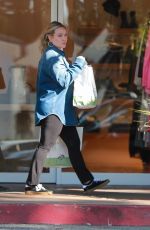 HILARY DUFF Picks up Lunch and Does Some Shopping in Beverly Hills 12/06/2023