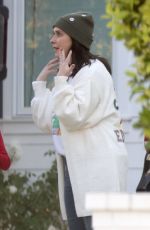 JENNIFER LOVE HEWITT Arrives at a Christmas Eve Party at a Friend