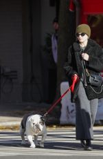 JULIA GARNER Out with Her Dog in New York 12/19/2023