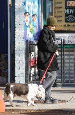 JULIA GARNER Out with Her Dog in New York 12/19/2023