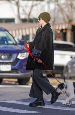 JULIA GARNER Out with Her Dog in New York 12/19/2023