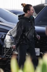 KALEY CUOCO and Tom Pelphrey Arrives at Burbank Airport 12/16/2023