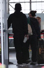 KALEY CUOCO and Tom Pelphrey Arrives at Burbank Airport 12/16/2023