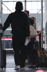 KALEY CUOCO and Tom Pelphrey Arrives at Burbank Airport 12/16/2023