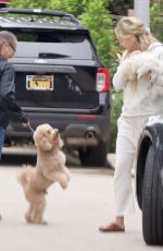 KATE HUDSON Out with Her Dog in Los Angeles 12/18/2023