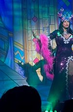 KATIE PRICE on Stage as Evil Witch During Her First Sleeping Beauty Pantomime Performance 12/16/2023