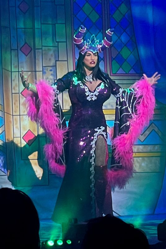 KATIE PRICE on Stage as Evil Witch During Her First Sleeping Beauty Pantomime Performance 12/16/2023