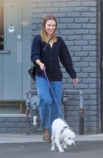 KRISTEN BELL Picks up Her Dog from Tailwaggers & Tailwashers Grooming Salon and Doggie Daycare in Los Angeles 12/13/2023