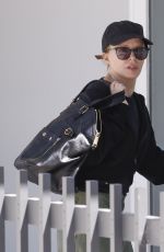 KYLIE MINOGUE Arrivesat Her Home in Melbourne 12/22/2023