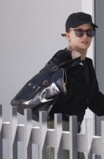 KYLIE MINOGUE Arrivesat Her Home in Melbourne 12/22/2023
