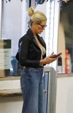 KYMBERLY MARCIANOIS Waiting for Her Car at a Valet in Beverly Hills 12/23/2023