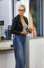 KYMBERLY MARCIANOIS Waiting for Her Car at a Valet in Beverly Hills 12/23/2023