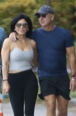 LAUREN SANCHEZ and Jeff Bezos Enjoying a Walk in a Park on Christmas Eve in Miami 12/24/2023
