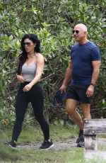 LAUREN SANCHEZ and Jeff Bezos Enjoying a Walk in a Park on Christmas Eve in Miami 12/24/2023