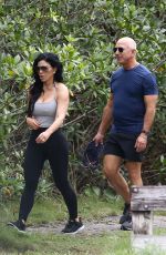 LAUREN SANCHEZ and Jeff Bezos Enjoying a Walk in a Park on Christmas Eve in Miami 12/24/2023