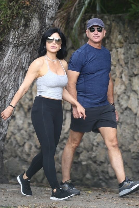 LAUREN SANCHEZ and Jeff Bezos Enjoying a Walk in a Park on Christmas Eve in Miami 12/24/2023