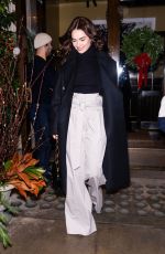 LILY JAMES Leaves Her Hotel in New York 12/17/2023