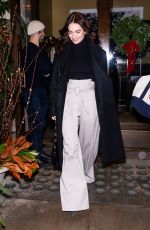 LILY JAMES Leaves Her Hotel in New York 12/17/2023