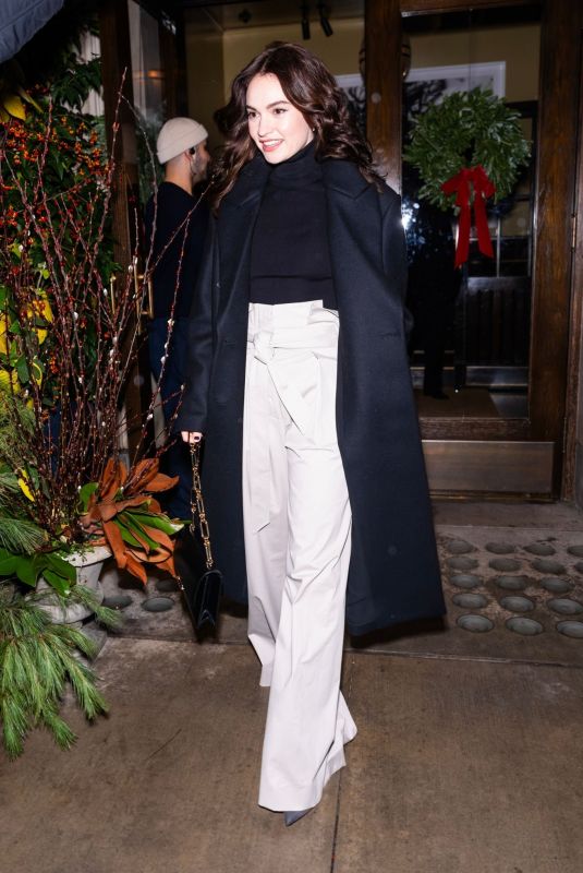 LILY JAMES Leaves Her Hotel in New York 12/17/2023