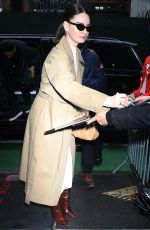LILY JAMES Leaves Today Show in New York 12/18/2023