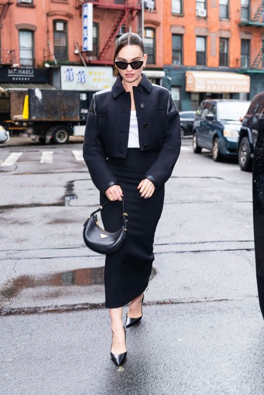 LILY JAMES Out for Press Day in New York 12/18/2023