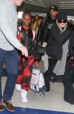 MADONNA Arrives at JFK Airport in New York 12/08/2023