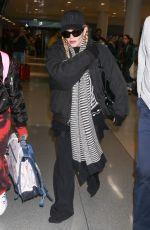 MADONNA Arrives at JFK Airport in New York 12/08/2023