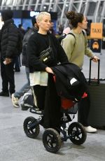 MEGAN RAPINOE and SUE BIRD Arrives at JFK Airport in New York 12/13/2023