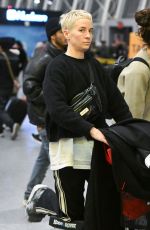 MEGAN RAPINOE and SUE BIRD Arrives at JFK Airport in New York 12/13/2023