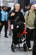 MEGAN RAPINOE and SUE BIRD Arrives at JFK Airport in New York 12/13/2023