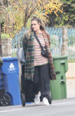 MIA SWIER Bringing in the Trash Cans in Los Angeles 12/22/2023