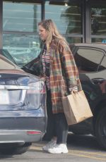 MIA SWIER Bringing in the Trash Cans in Los Angeles 12/22/2023