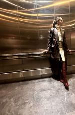 MICHELLE MONAGHAN Visits Empire State Building in New York 12/11/2023