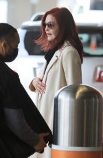 PRISCILLA PRESLEY Arrives at LAX Airport in Los Angeles 12/01/2023